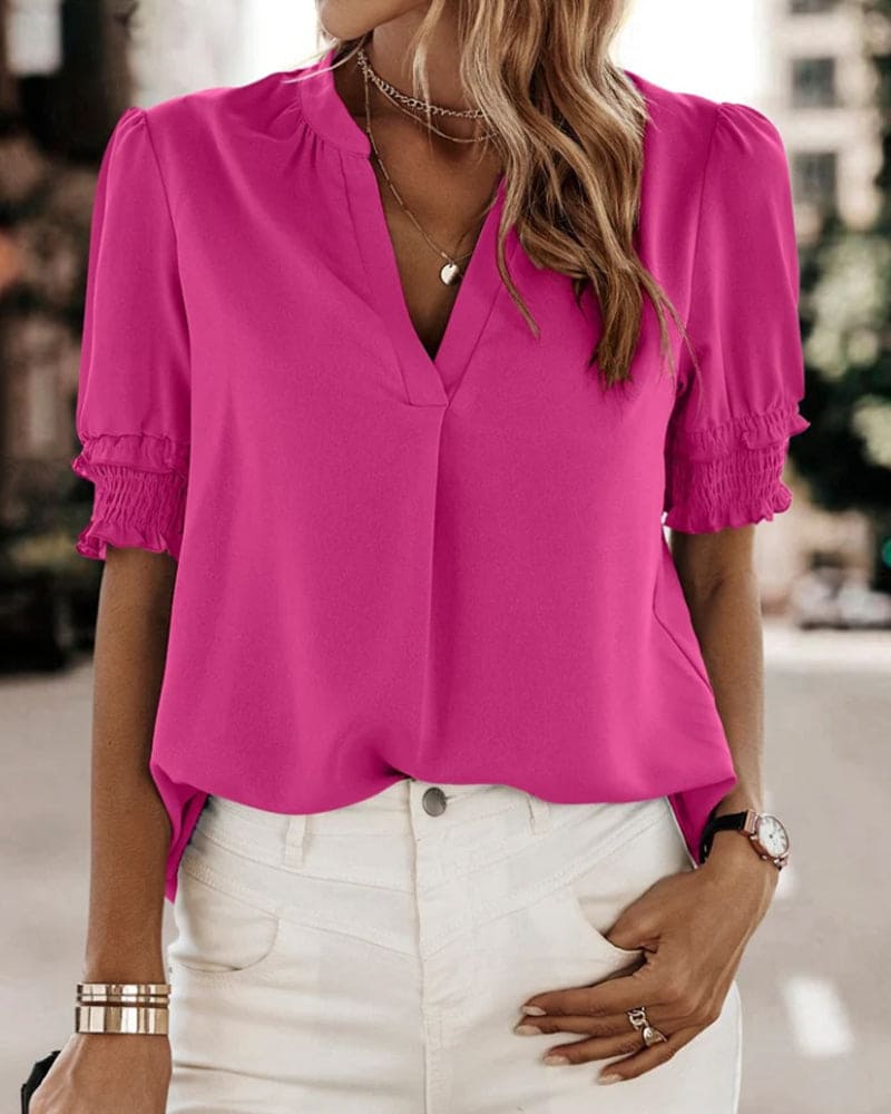 https://cdn.shopify.com/s/files/1/0830/7487/5738/files/Aria___Premium_Smocked_Cuff_V-Neck_Blouse_0.jpg?v=1778598152