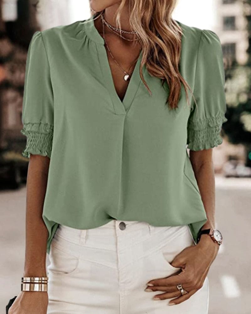 https://cdn.shopify.com/s/files/1/0830/7487/5738/files/Aria___Premium_Smocked_Cuff_V-Neck_Blouse_4.jpg?v=1778598152