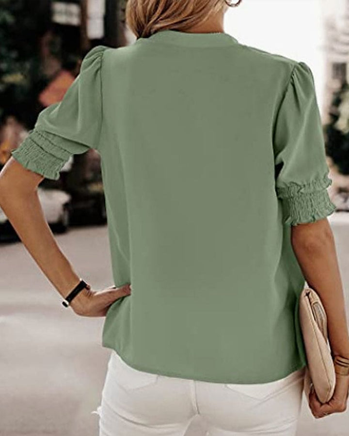 https://cdn.shopify.com/s/files/1/0830/7487/5738/files/Aria___Premium_Smocked_Cuff_V-Neck_Blouse_7.jpg?v=1778598152