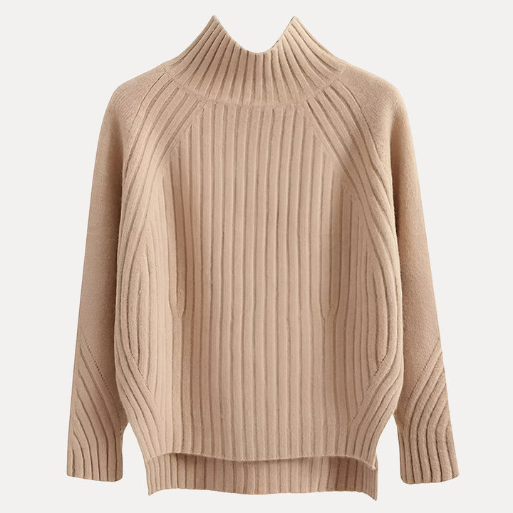 https://cdn.shopify.com/s/files/1/0830/7487/5738/files/CharlotteSide-SlitTurtleneckSweaterApricotFlatLay.jpg?v=1773741466