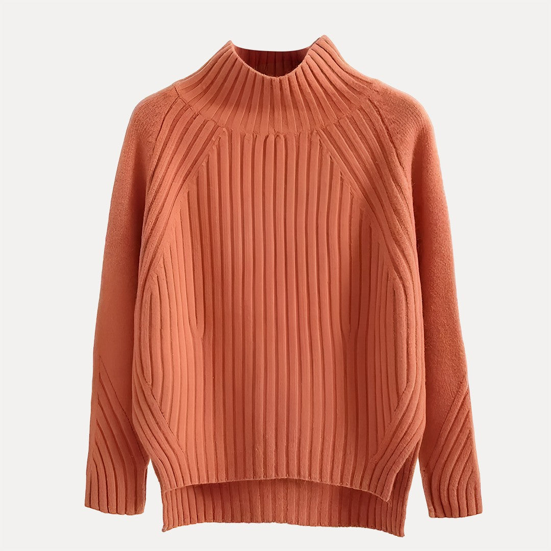 https://cdn.shopify.com/s/files/1/0830/7487/5738/files/CharlotteSide-SlitTurtleneckSweaterCoralFlatLay.jpg?v=1773741465