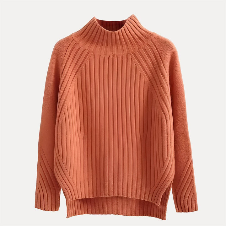 https://cdn.shopify.com/s/files/1/0830/7487/5738/files/CharlotteSide-SlitTurtleneckSweaterCoralFlatLay.jpg?v=1773741465