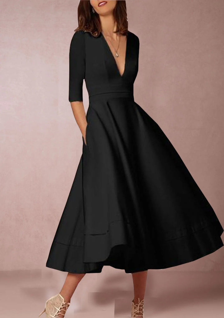 https://cdn.shopify.com/s/files/1/0830/7487/5738/files/Elara___White_Midi_Dress__Retro-Inspired__Elegant__amp__Flattering_A-Line_3.jpg?v=1778597130