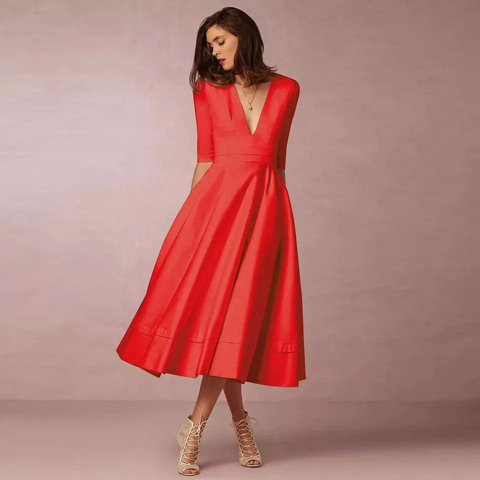 https://cdn.shopify.com/s/files/1/0830/7487/5738/files/Elara___White_Midi_Dress__Retro-Inspired__Elegant__amp__Flattering_A-Line_5.jpg?v=1778597130