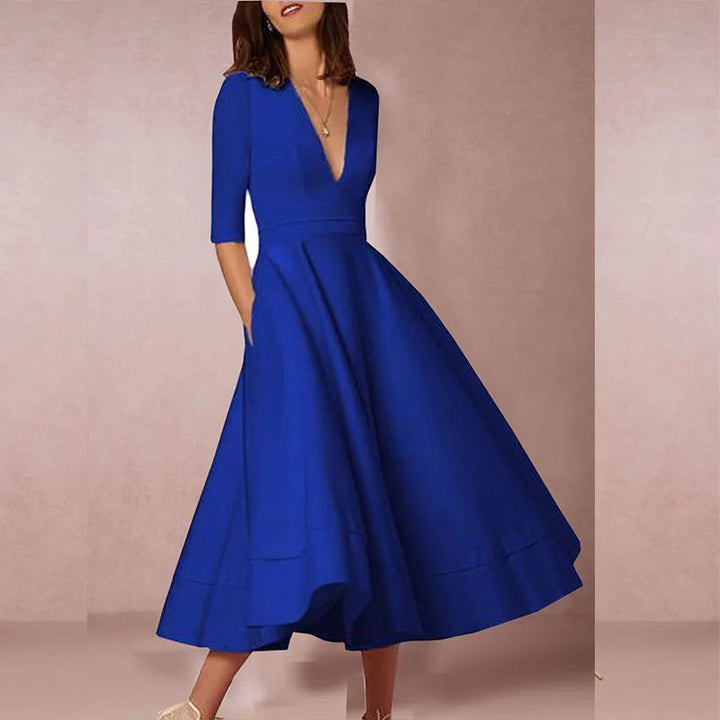 https://cdn.shopify.com/s/files/1/0830/7487/5738/files/Elara___White_Midi_Dress__Retro-Inspired__Elegant__amp__Flattering_A-Line_7.jpg?v=1778597130