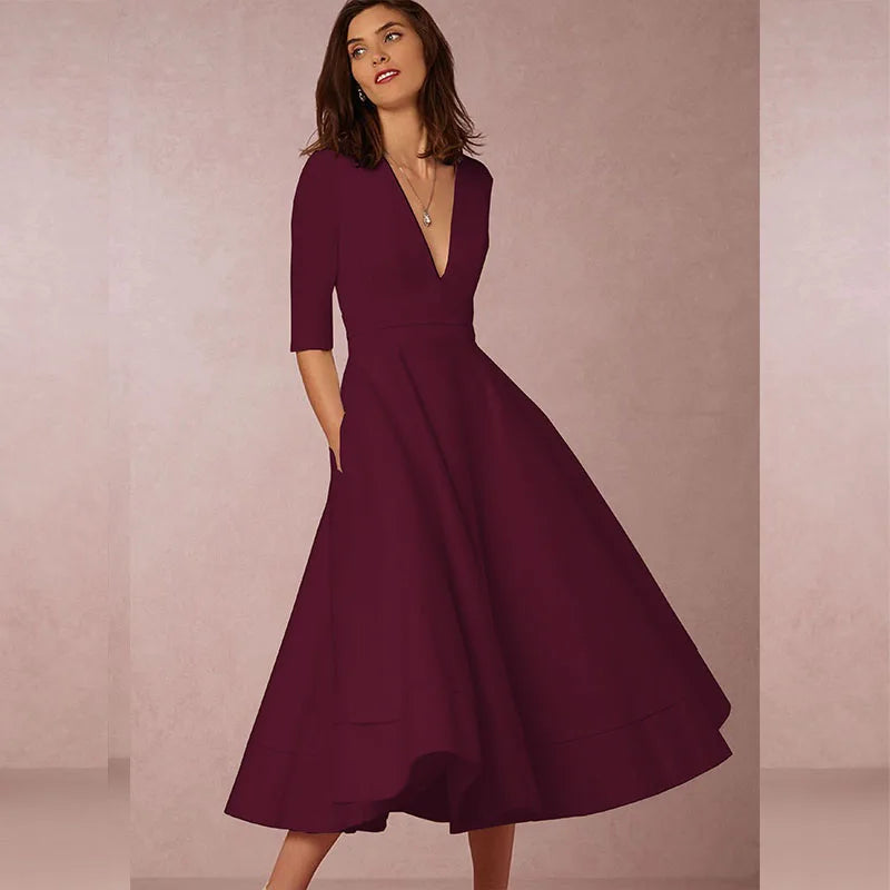 https://cdn.shopify.com/s/files/1/0830/7487/5738/files/Elara___White_Midi_Dress__Retro-Inspired__Elegant__amp__Flattering_A-Line_8.jpg?v=1778597130
