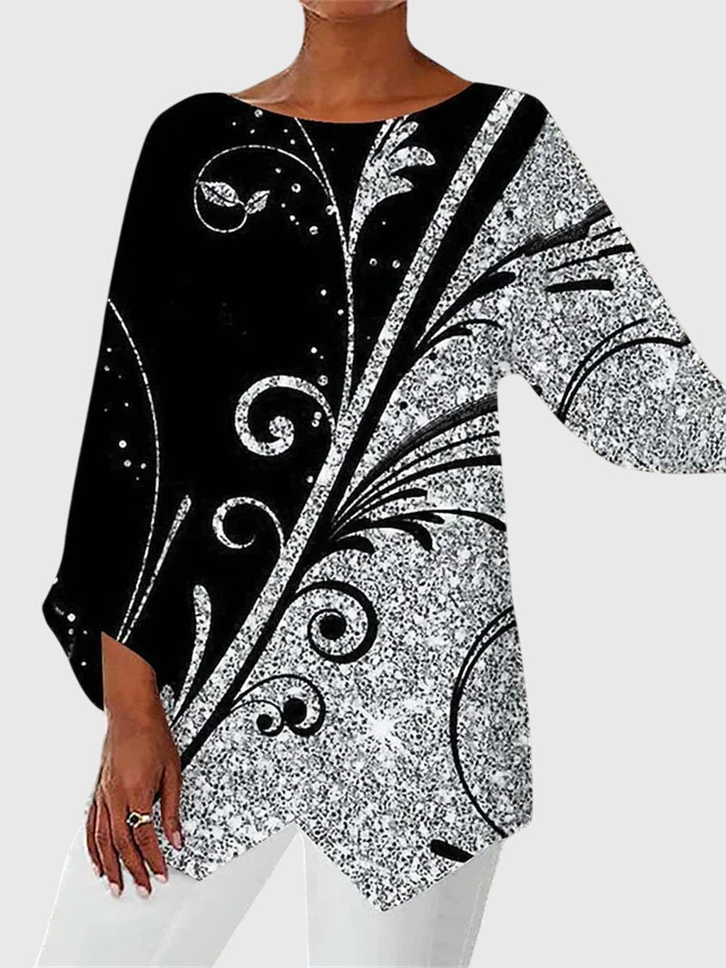 https://cdn.shopify.com/s/files/1/0830/7487/5738/files/Eleanor___Elegant_butterfly_print_top_with_asymmetric_hem_5.jpg?v=1778598149