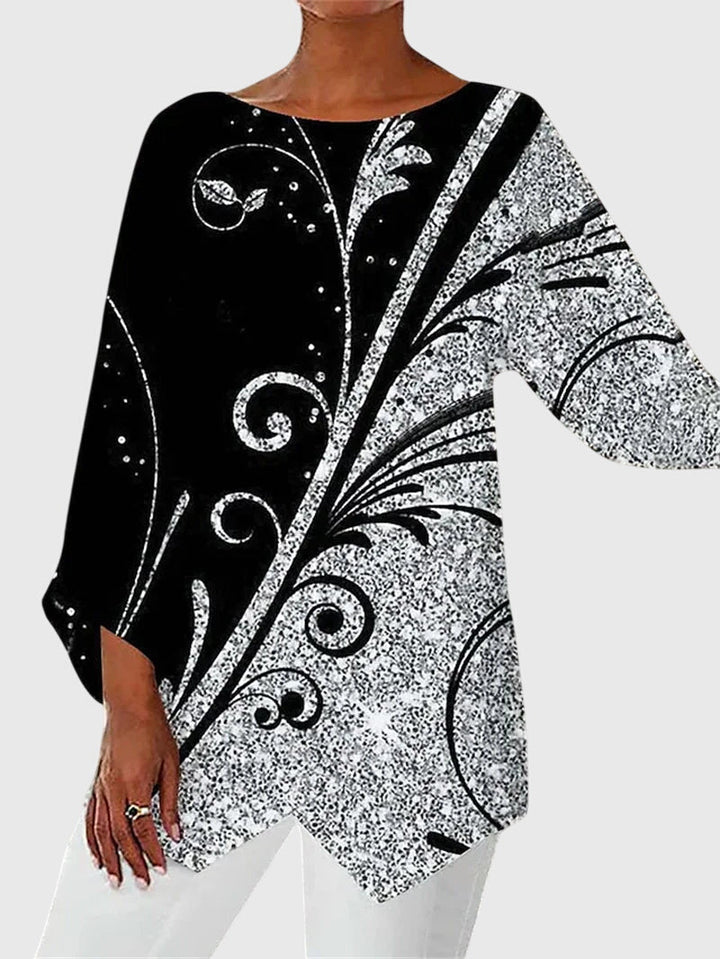 https://cdn.shopify.com/s/files/1/0830/7487/5738/files/Eleanor___Elegant_butterfly_print_top_with_asymmetric_hem_5.jpg?v=1778598149
