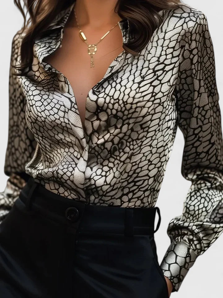 https://cdn.shopify.com/s/files/1/0830/7487/5738/files/Florence___Stylish_Printed_long-sleeve_collared_blouse_2.jpg?v=1778598149