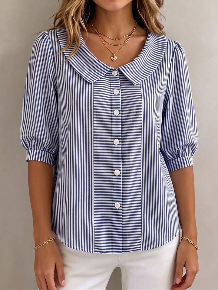 https://cdn.shopify.com/s/files/1/0830/7487/5738/files/Gina___Elegant_Vertical_Striped_Quarter_Sleeve_Blouse_0.jpg?v=1778598151