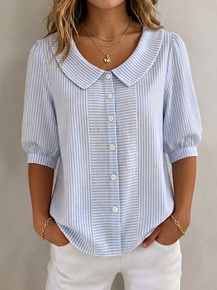 https://cdn.shopify.com/s/files/1/0830/7487/5738/files/Gina___Elegant_Vertical_Striped_Quarter_Sleeve_Blouse_1.jpg?v=1778598151