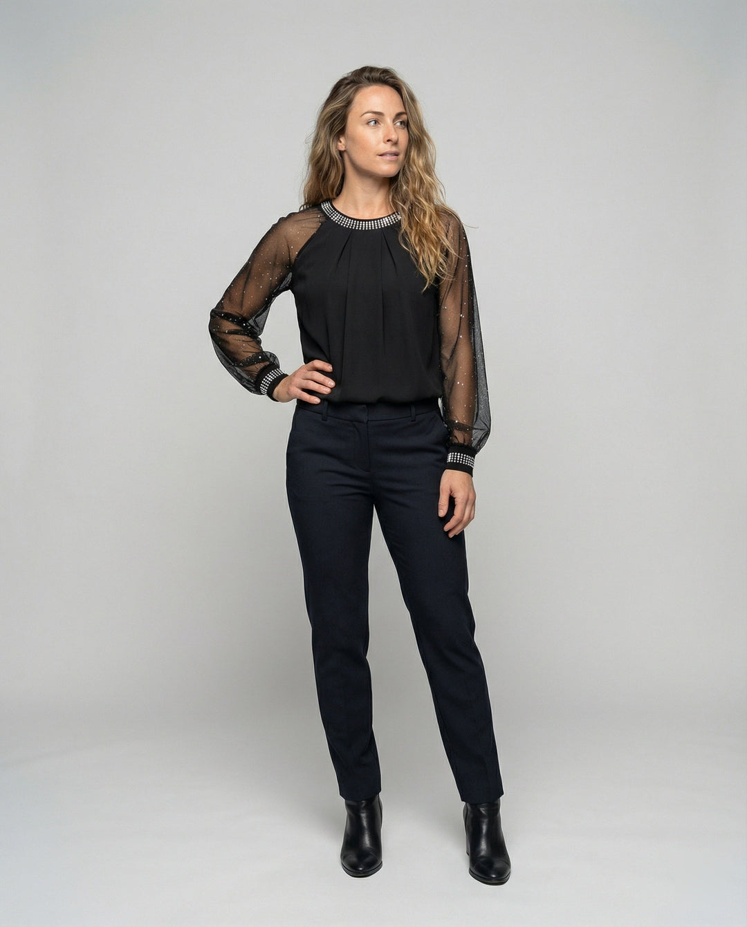https://cdn.shopify.com/s/files/1/0830/7487/5738/files/Helaine___Women_s_Sequin_Top__Elegant__Soft___Chic_Blouse_for_Any_Occasion_0.jpg?v=1778598168