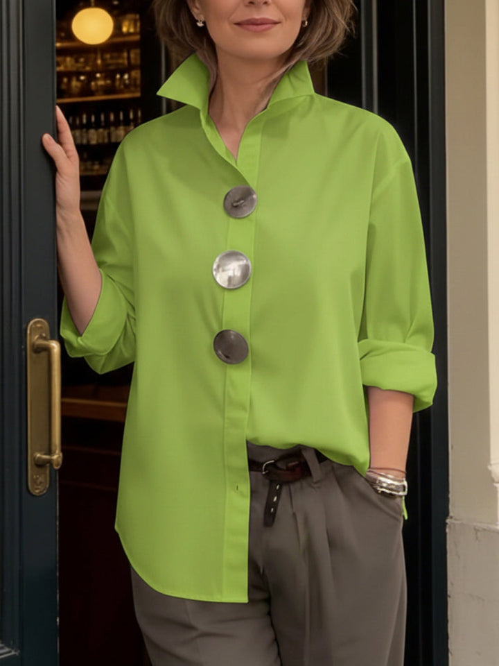 https://cdn.shopify.com/s/files/1/0830/7487/5738/files/Isabella___Elegant_and_modern_blouse_with_a_stand-up_collar_1.jpg?v=1778598147