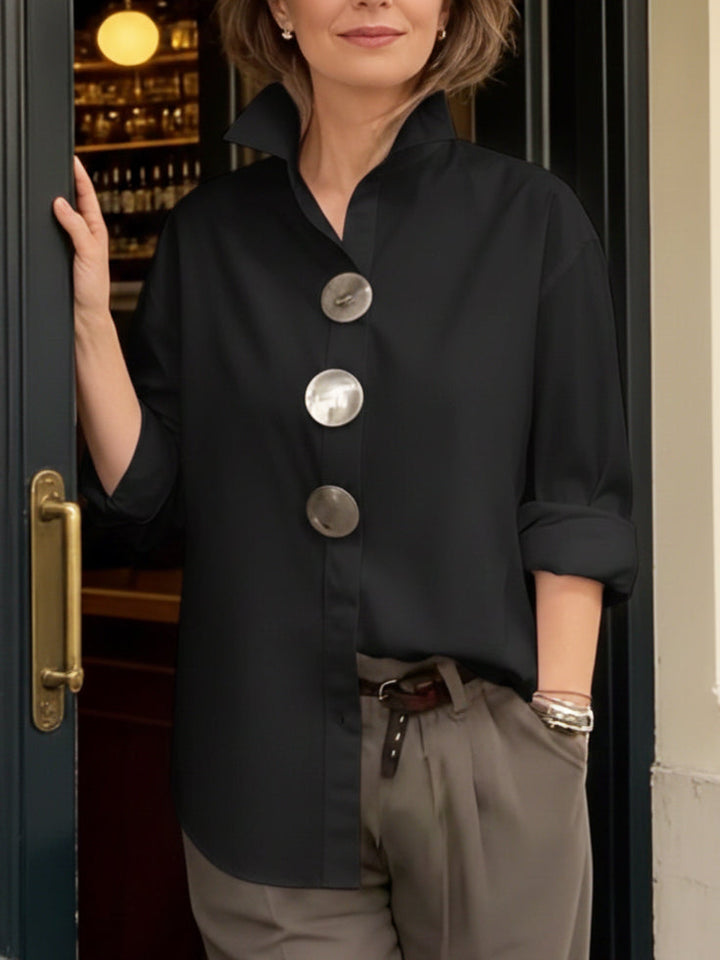 https://cdn.shopify.com/s/files/1/0830/7487/5738/files/Isabella___Elegant_and_modern_blouse_with_a_stand-up_collar_2.jpg?v=1778598147