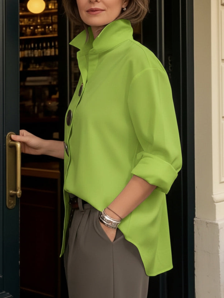 https://cdn.shopify.com/s/files/1/0830/7487/5738/files/Isabella___Elegant_and_modern_blouse_with_a_stand-up_collar_8.jpg?v=1778598147