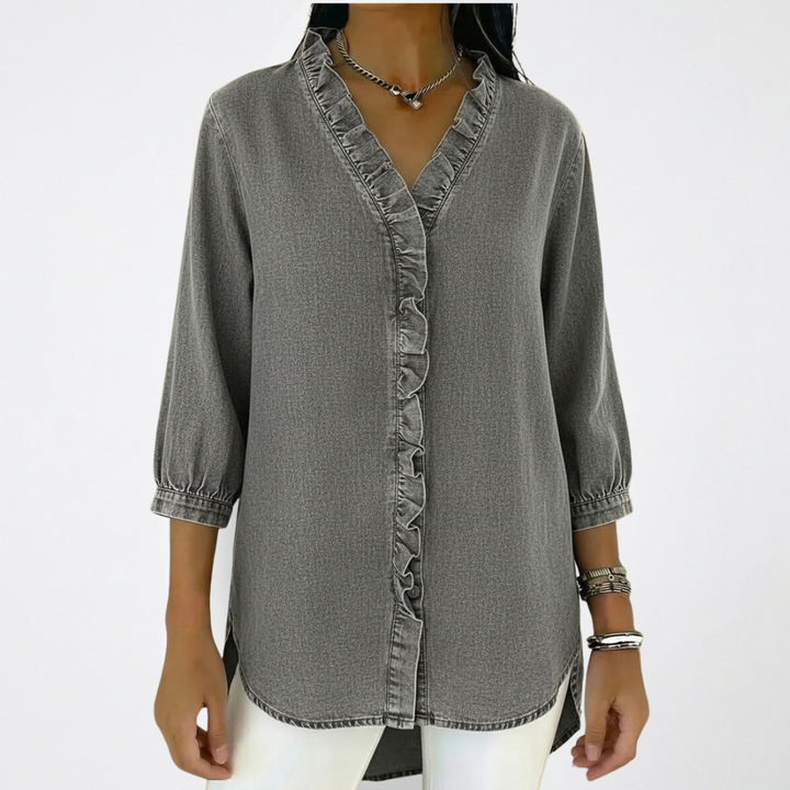 https://cdn.shopify.com/s/files/1/0830/7487/5738/files/Karin___Stylish_and_sophisticated_blouse_with_ruffles_1.png?v=1778598160