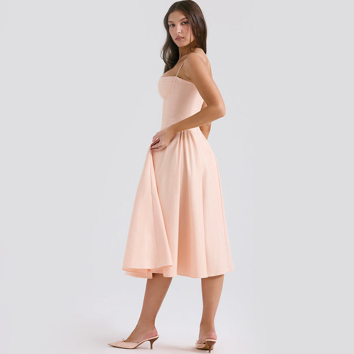https://cdn.shopify.com/s/files/1/0830/7487/5738/files/Liora___White_Midi_Dress__Elegant__Flattering___Versatile_for_Every_Occasion_3.jpg?v=1778597092