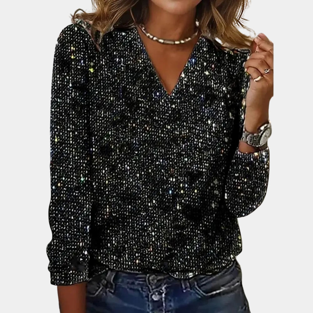 https://cdn.shopify.com/s/files/1/0830/7487/5738/files/Lisa___Elegant_and_Sparkling_V-Neck_Glitter_Top_0.png?v=1778598159