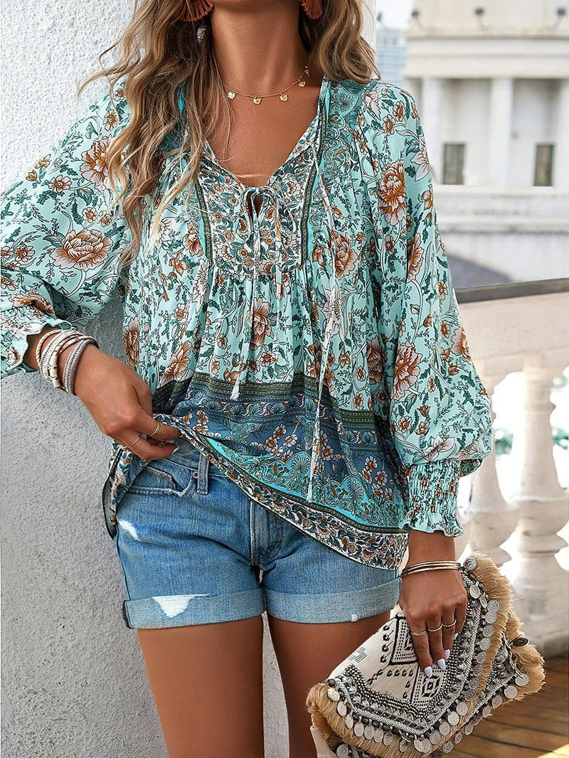 https://cdn.shopify.com/s/files/1/0830/7487/5738/files/Lisa___Lightweight_and_stylish_floral_print_top_2.jpg?v=1778598168