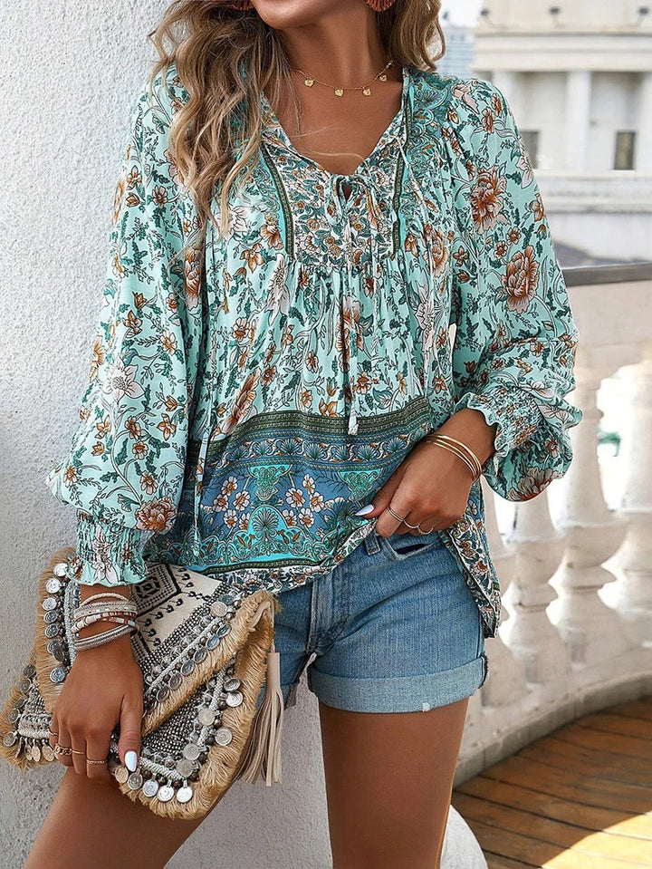 https://cdn.shopify.com/s/files/1/0830/7487/5738/files/Lisa___Lightweight_and_stylish_floral_print_top_4.jpg?v=1778598168