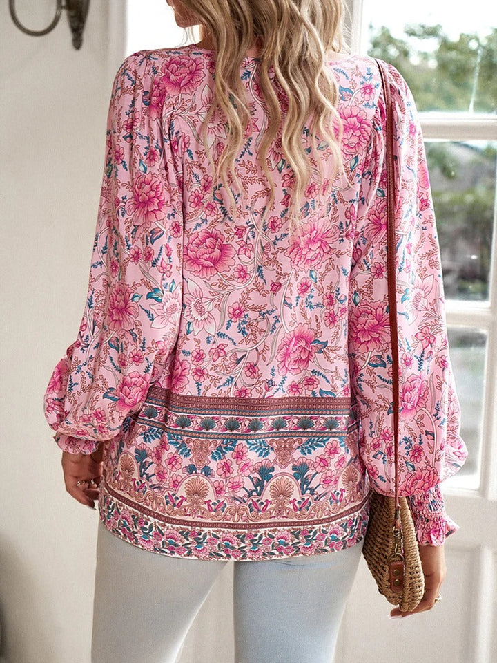 https://cdn.shopify.com/s/files/1/0830/7487/5738/files/Lisa___Lightweight_and_stylish_floral_print_top_6.jpg?v=1778598168