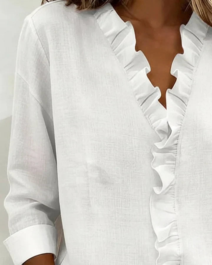 https://cdn.shopify.com/s/files/1/0830/7487/5738/files/Livia___Elegant_Ruffled_V-Neck_Women_s_Blouse_for_Summer_5.jpg?v=1778598144