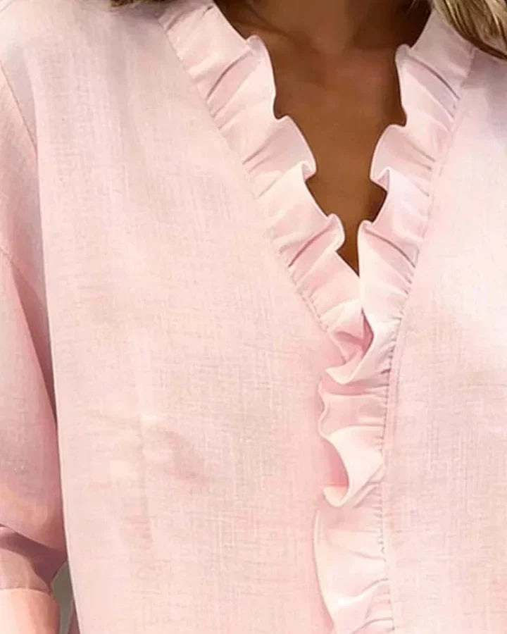 https://cdn.shopify.com/s/files/1/0830/7487/5738/files/Livia___Elegant_Ruffled_V-Neck_Women_s_Blouse_for_Summer_8.jpg?v=1778598144