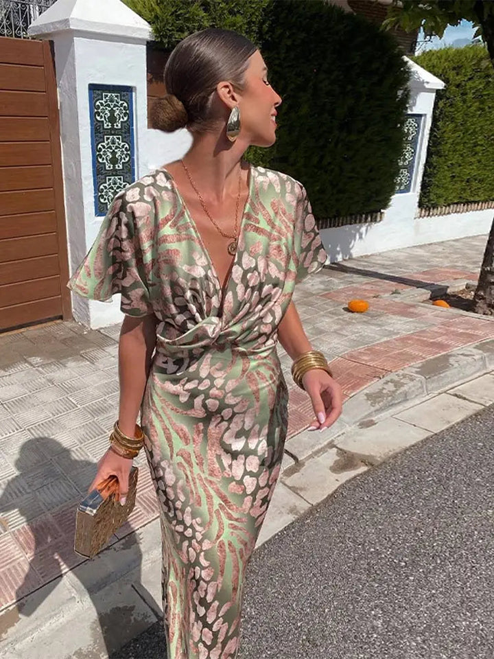 https://cdn.shopify.com/s/files/1/0830/7487/5738/files/LunaBelle___Elegant_Twisted_Knot_Women_s_Dress_for_Wedding_Guests_2.jpg?v=1778597038