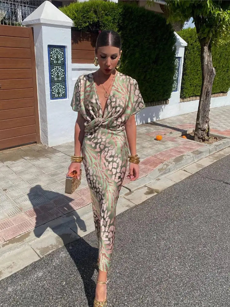 https://cdn.shopify.com/s/files/1/0830/7487/5738/files/LunaBelle___Elegant_Twisted_Knot_Women_s_Dress_for_Wedding_Guests_3.jpg?v=1778597038