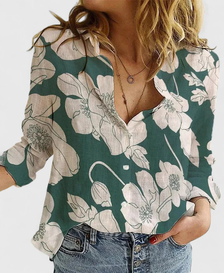 https://cdn.shopify.com/s/files/1/0830/7487/5738/files/Mary___Floral_V-neck_long-sleeve_blouse_3.jpg?v=1778598149