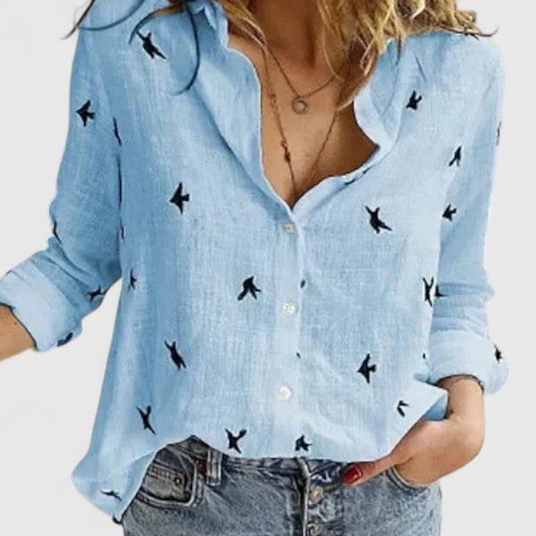 https://cdn.shopify.com/s/files/1/0830/7487/5738/files/Mary___Floral_V-neck_long-sleeve_blouse_7.jpg?v=1778598149