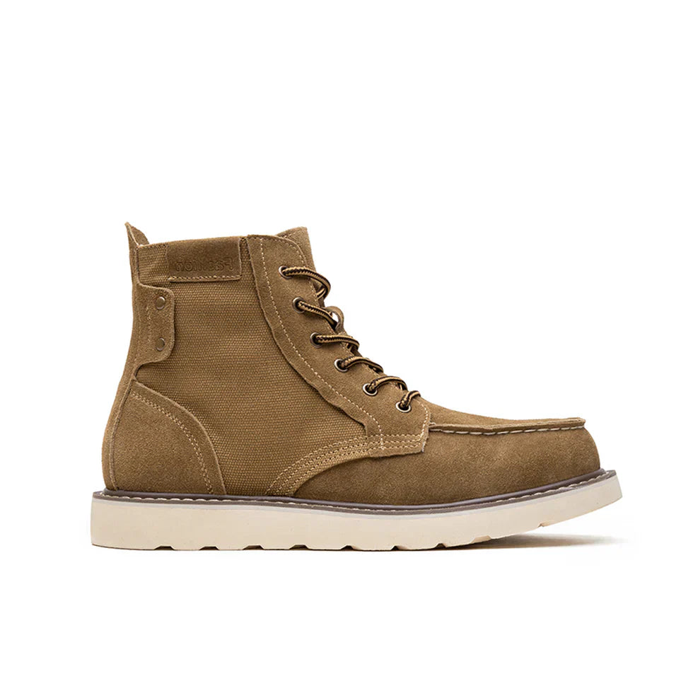 https://cdn.shopify.com/s/files/1/0830/7487/5738/files/Men_s6Moc-ToeWedgeBoots-HeritageSuedeC003_1.webp?v=1773580965
