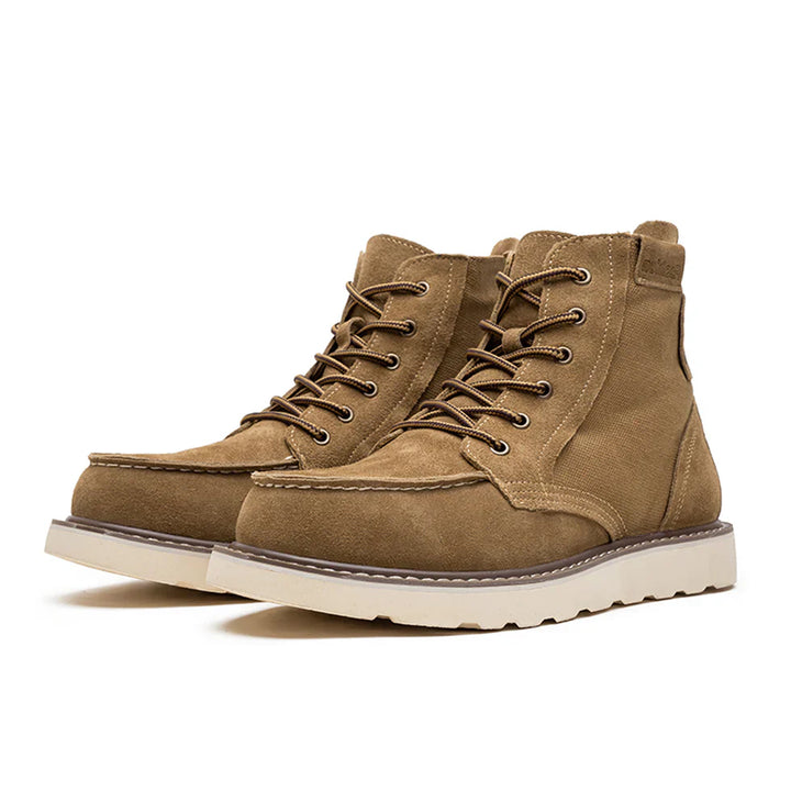 https://cdn.shopify.com/s/files/1/0830/7487/5738/files/Men_s6Moc-ToeWedgeBoots-HeritageSuedeC003_5.webp?v=1773580964