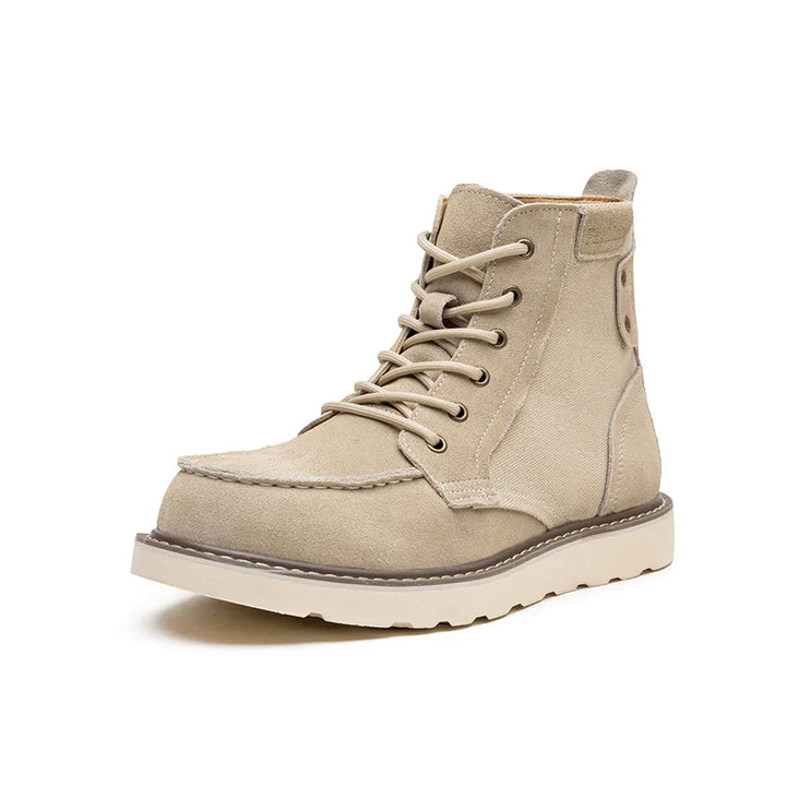 https://cdn.shopify.com/s/files/1/0830/7487/5738/files/Men_s6Moc-ToeWedgeBoots-HeritageSuedeC003_8.webp?v=1773580965