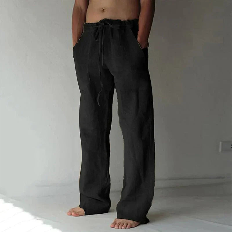 https://cdn.shopify.com/s/files/1/0913/7753/3275/files/Mens-Baggy-Linen-Summer-Trousers-11.webp?v=1773053764
