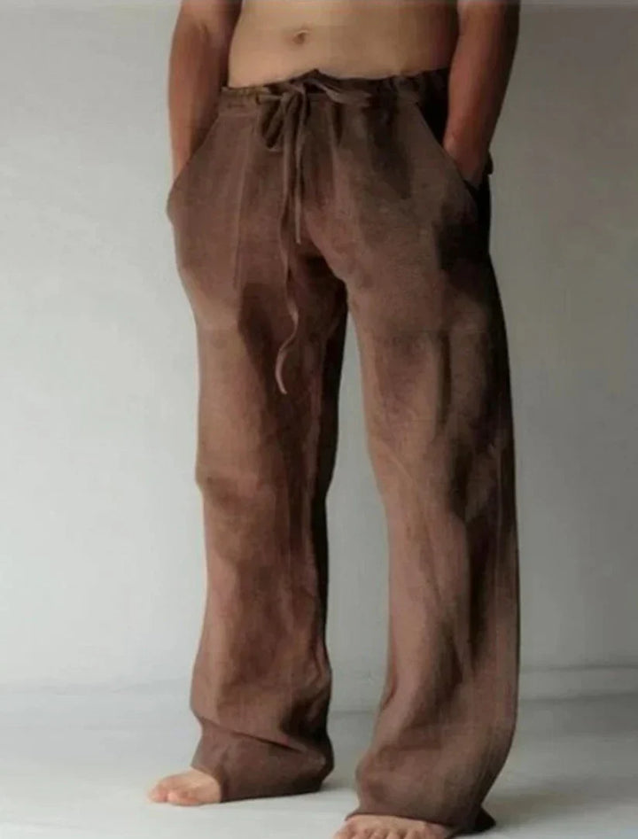 https://cdn.shopify.com/s/files/1/0913/7753/3275/files/Mens-Baggy-Linen-Summer-Trousers-13.webp?v=1773053769