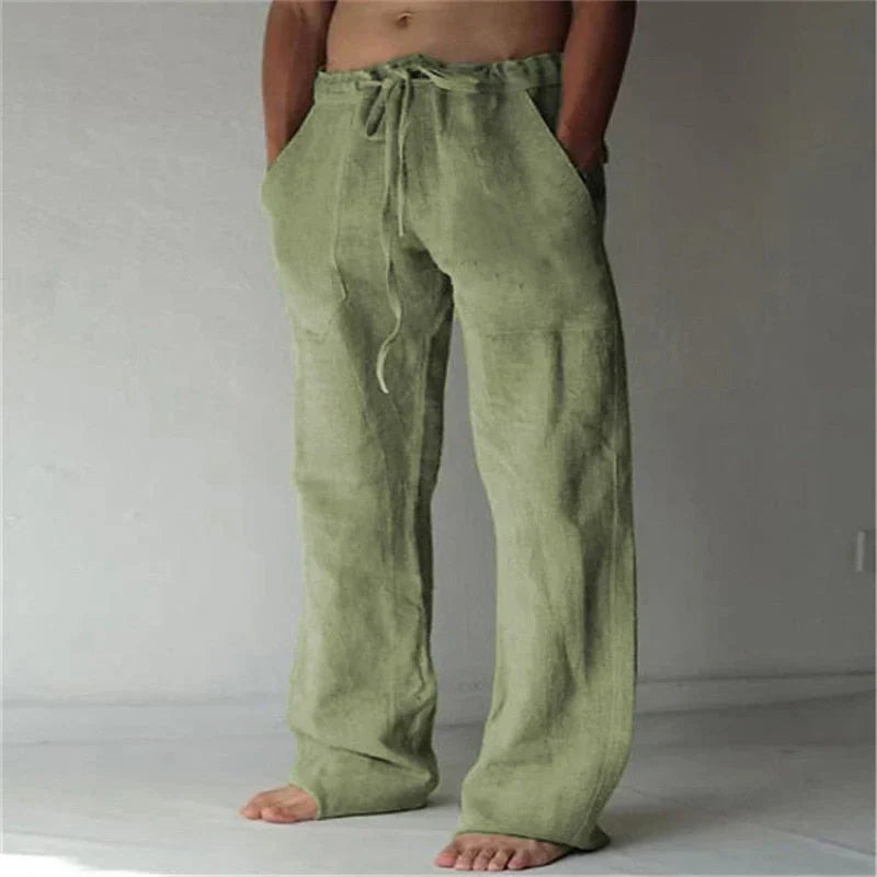 https://cdn.shopify.com/s/files/1/0913/7753/3275/files/Mens-Baggy-Linen-Summer-Trousers-2.webp?v=1773053743