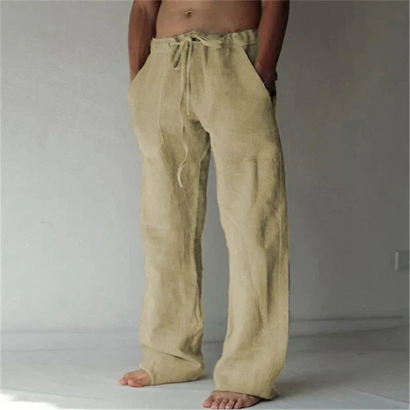 https://cdn.shopify.com/s/files/1/0913/7753/3275/files/Mens-Baggy-Linen-Summer-Trousers-3.webp?v=1773053745