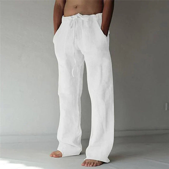 https://cdn.shopify.com/s/files/1/0913/7753/3275/files/Mens-Baggy-Linen-Summer-Trousers.webp?v=1773053740