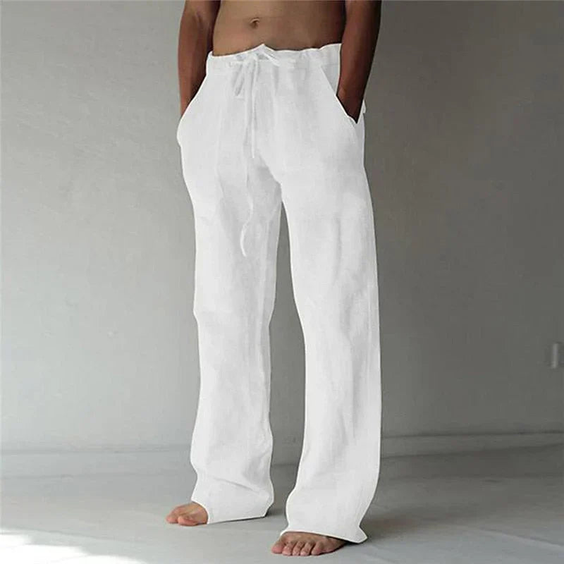 https://cdn.shopify.com/s/files/1/0913/7753/3275/files/Mens-Baggy-Linen-Summer-Trousers.webp?v=1773053740