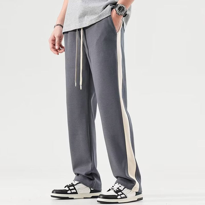 https://cdn.shopify.com/s/files/1/0913/7753/3275/files/Mens-Color-Block-Wide-Trousers-Relaxed-Fit-Casual-Pants-3.jpg?v=1773079619