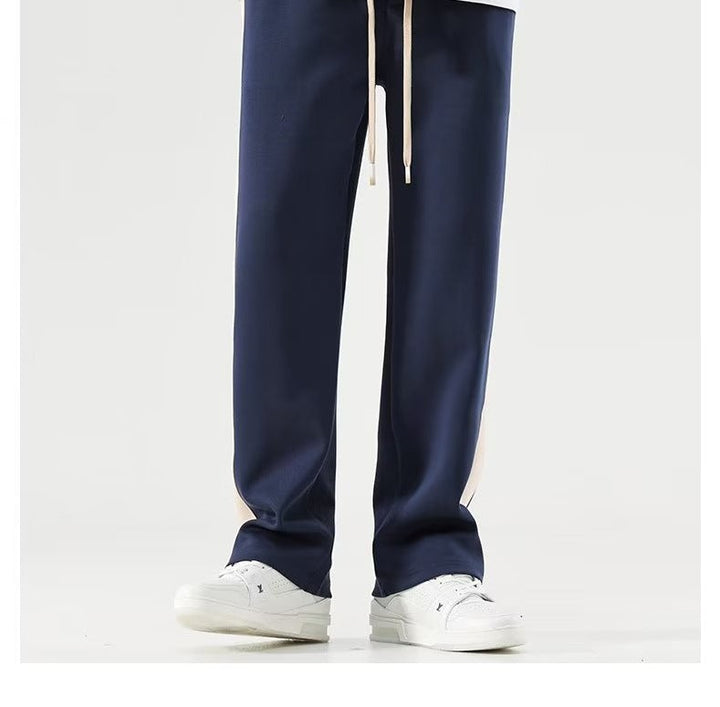 https://cdn.shopify.com/s/files/1/0913/7753/3275/files/Mens-Color-Block-Wide-Trousers-Relaxed-Fit-Casual-Pants-9.jpg?v=1773079635