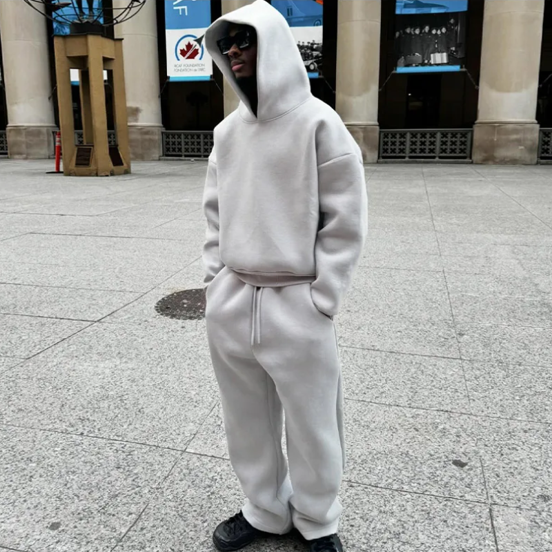 https://cdn.shopify.com/s/files/1/0913/7753/3275/files/Mens-Hoodie-and-Jogging-Set-for-Casual-Comfort-2.png?v=1773077443