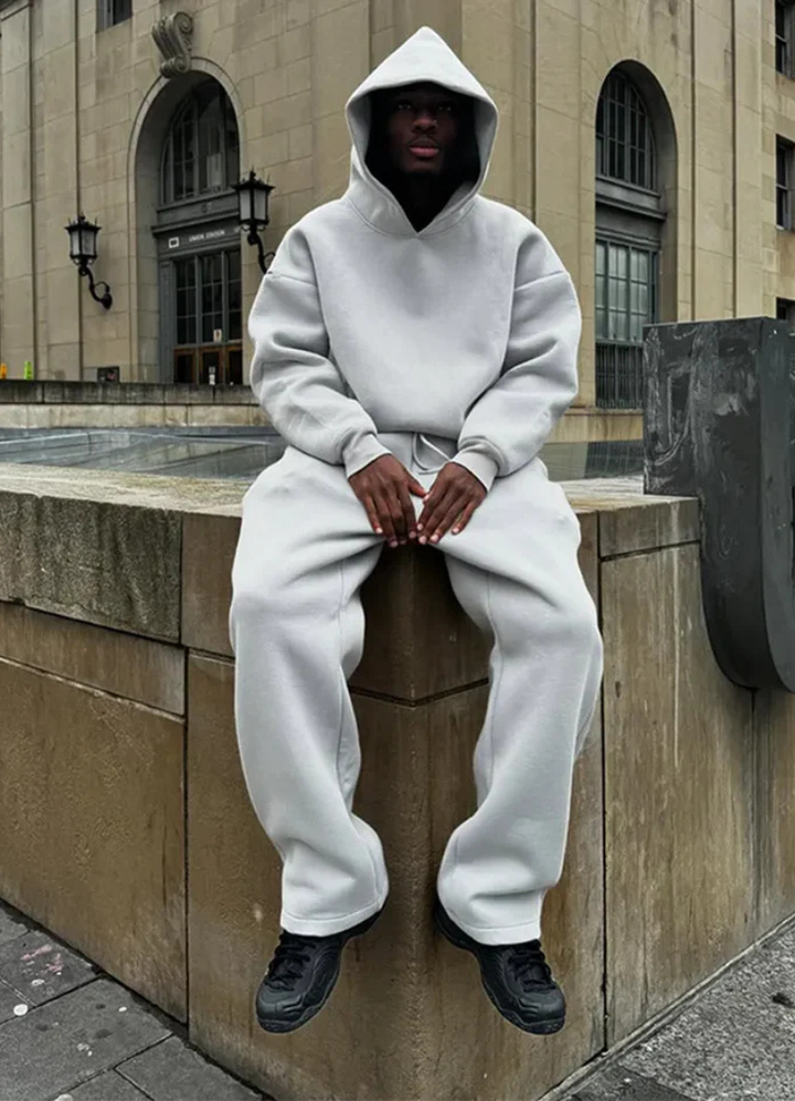 https://cdn.shopify.com/s/files/1/0913/7753/3275/files/Mens-Hoodie-and-Jogging-Set-for-Casual-Comfort-3.png?v=1773077448