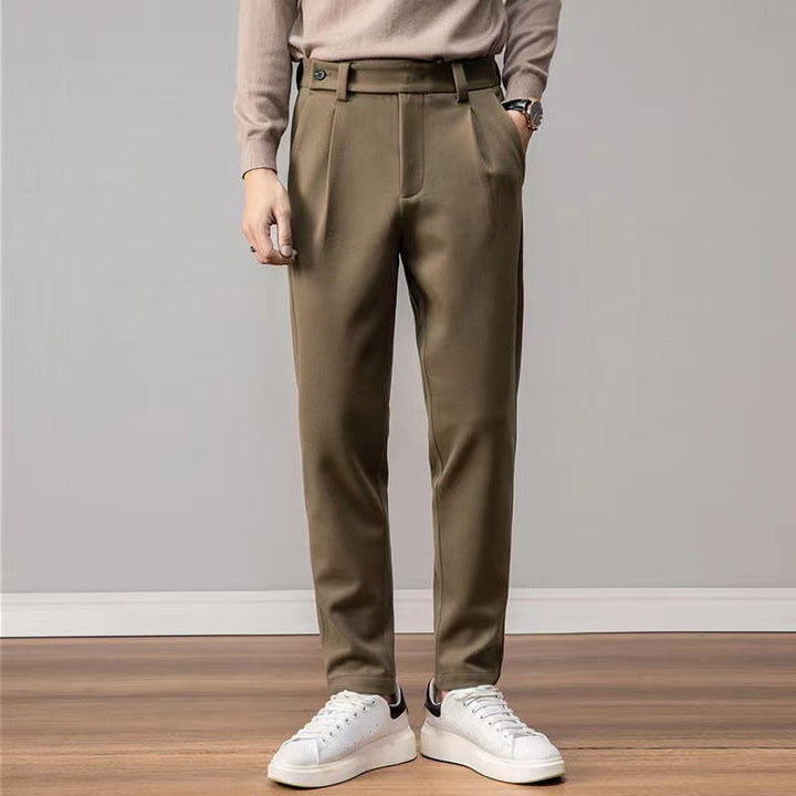 https://cdn.shopify.com/s/files/1/0913/7753/3275/files/Mens-Loose-Fit-Trousers-for-Relaxed-Comfort-2.jpg?v=1773079411
