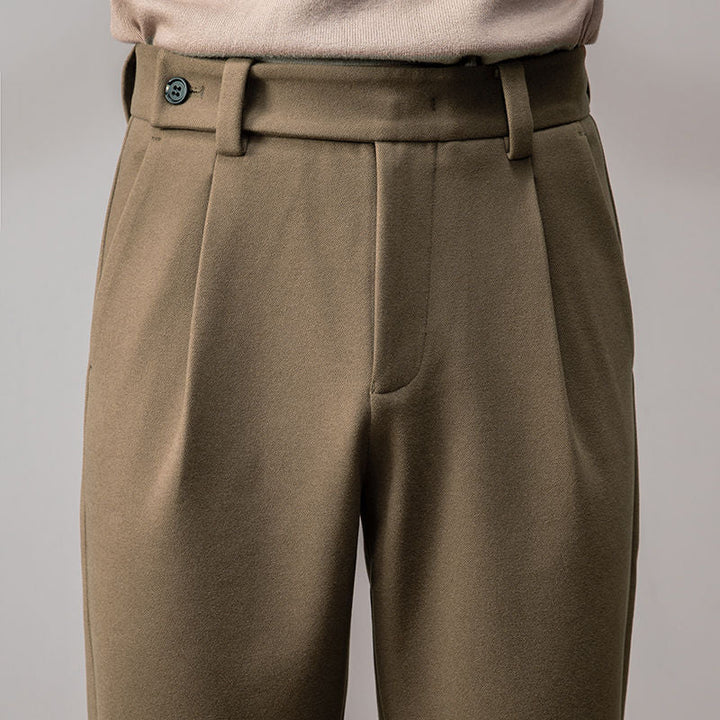 https://cdn.shopify.com/s/files/1/0913/7753/3275/files/Mens-Loose-Fit-Trousers-for-Relaxed-Comfort-6.jpg?v=1773079423