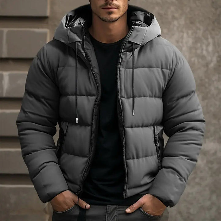https://cdn.shopify.com/s/files/1/0913/7753/3275/files/Mens-Puffer-Jacket-with-Hood-for-Ultimate-Winter-Comfort.jpg?v=1773071003