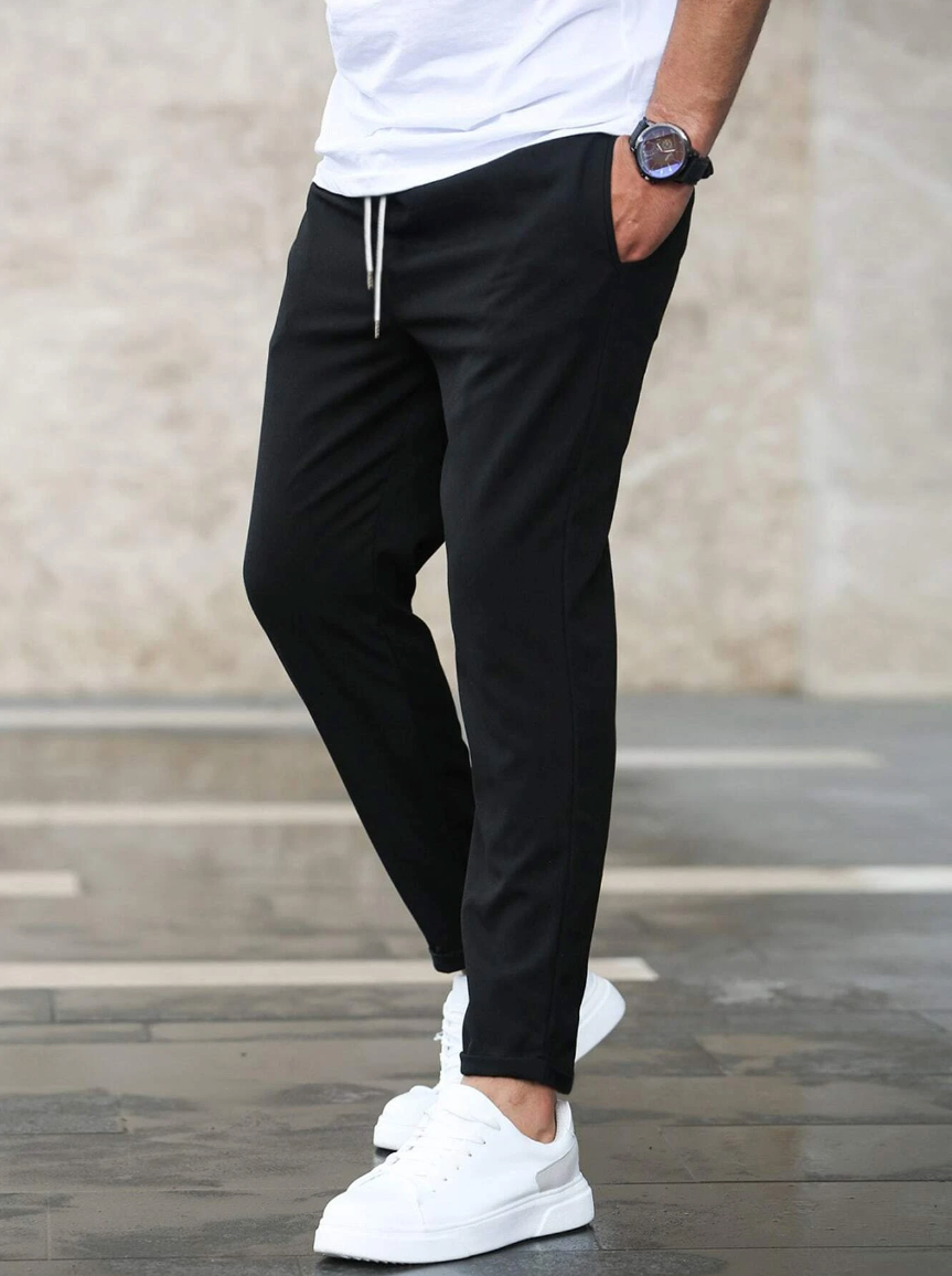 https://cdn.shopify.com/s/files/1/0913/7753/3275/files/Mens-Stretch-Trousers-Premium-Comfort-Black-Pants-8.png?v=1773064093