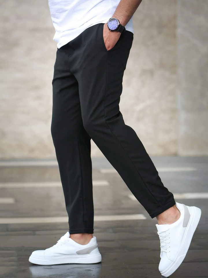 https://cdn.shopify.com/s/files/1/0913/7753/3275/files/Mens-Stretch-Trousers-Premium-Comfort-Black-Pants-9.png?v=1773064099