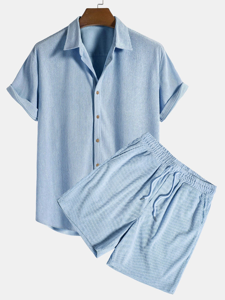 https://cdn.shopify.com/s/files/1/0913/7753/3275/files/Mens-Summer-Set-Shirt-and-Shorts-Outfit-9.jpg?v=1773053059